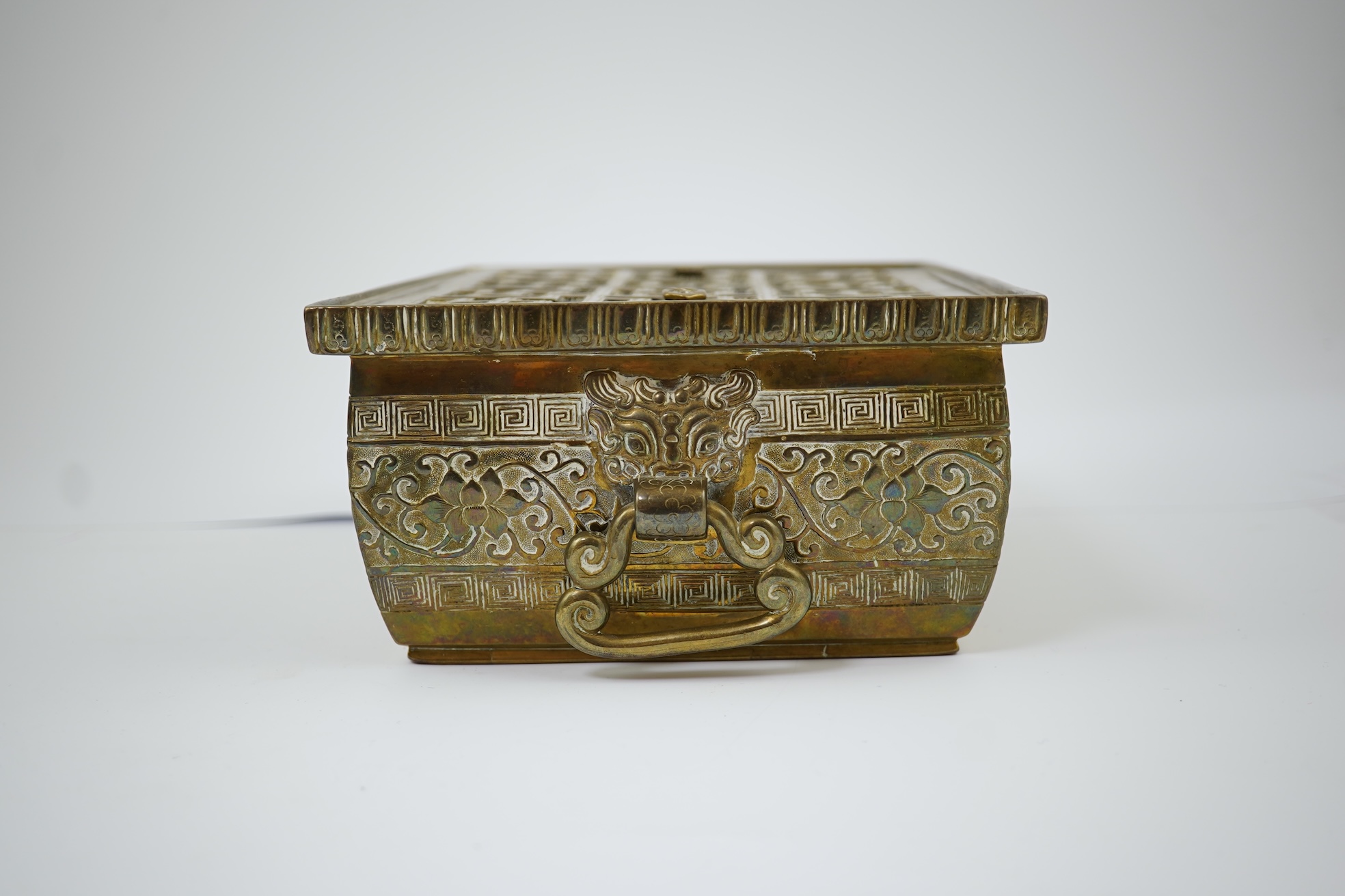 A large Chinese bronze rectangular censer and cover, Xuande seal mark, and a ‘plum blossom and chilong’ bronze censer, both 19th century